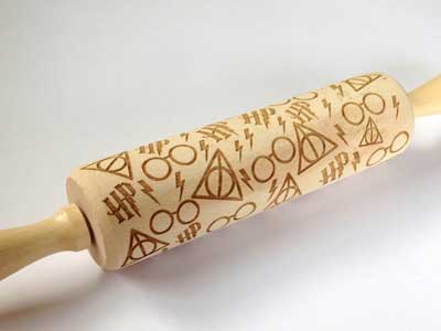 Rolling pin with Harry Potter designs on it