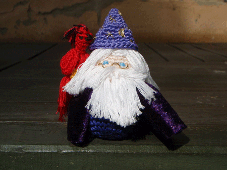 Amigurumi versions of Albus Dumbledore and his Pheonix Fawkes