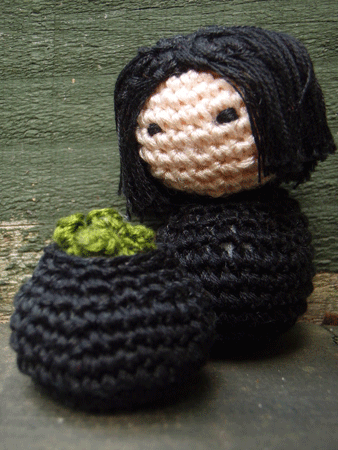 Amigurumi version of Severus Snape and a potion cauldron