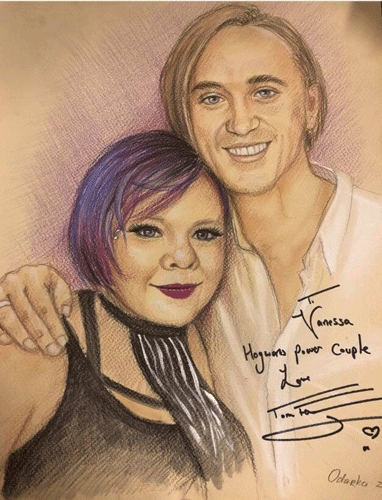 This is a picture that Vanessa Neimeyer had made of her with Tom Felton that he autographed.