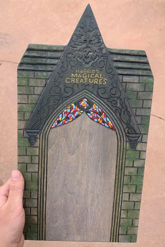 This is an autograph board that Vanessa had made specifically for Tom Felton to sign. It is a replica of the entrance to the new Hagrid's Magical Creatures Motorcycle Ride at Universal Studios.