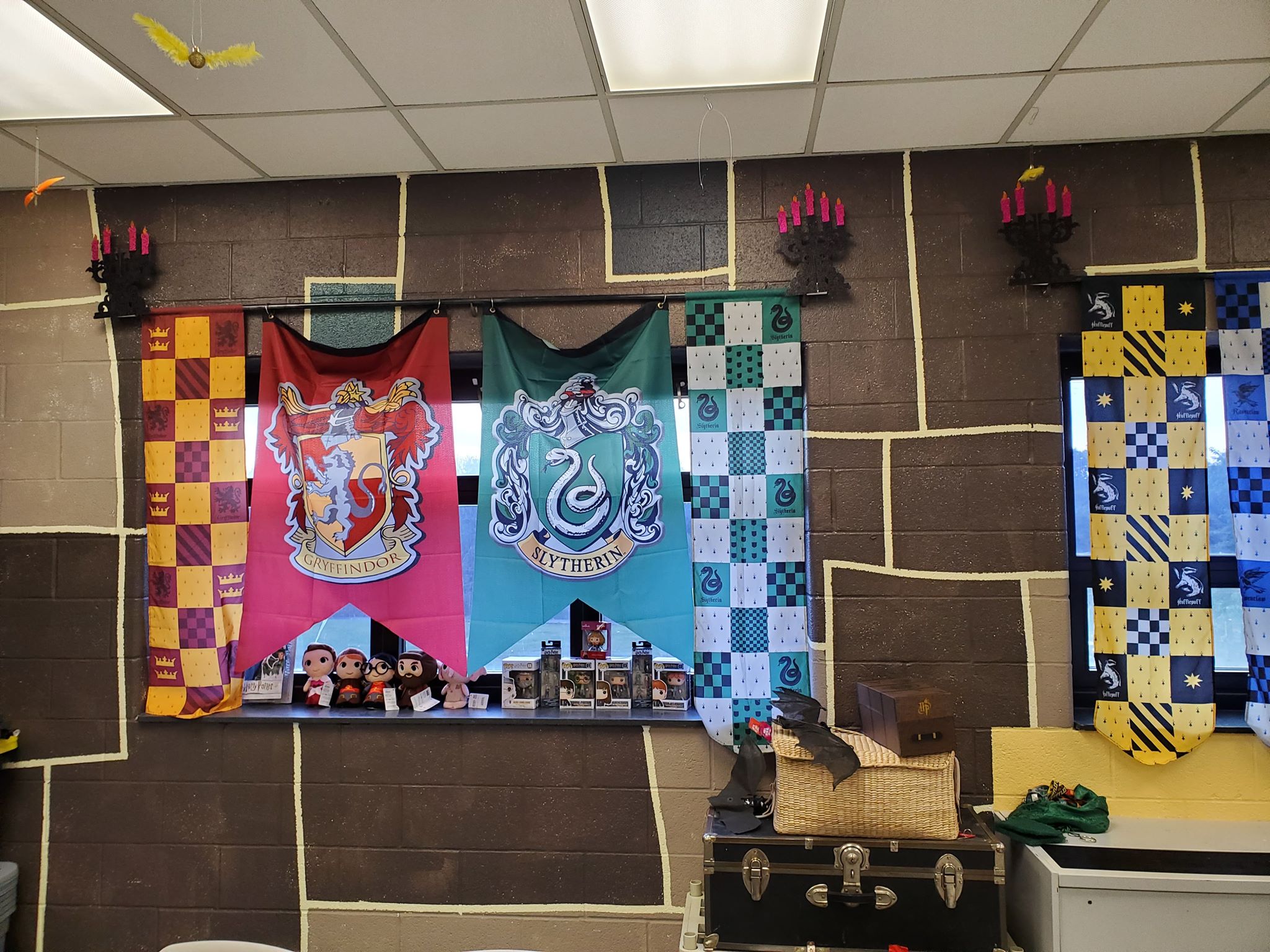 Hogwarts house banners for Gryffindor and Slytherin.