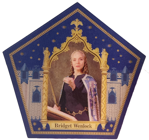 This is the front of the Bridget Wenlock card, with her holding a feather quill.