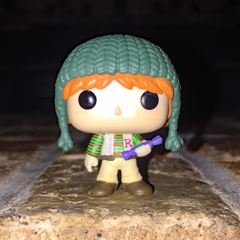 Ron Weasley Funko holding a Christmas present