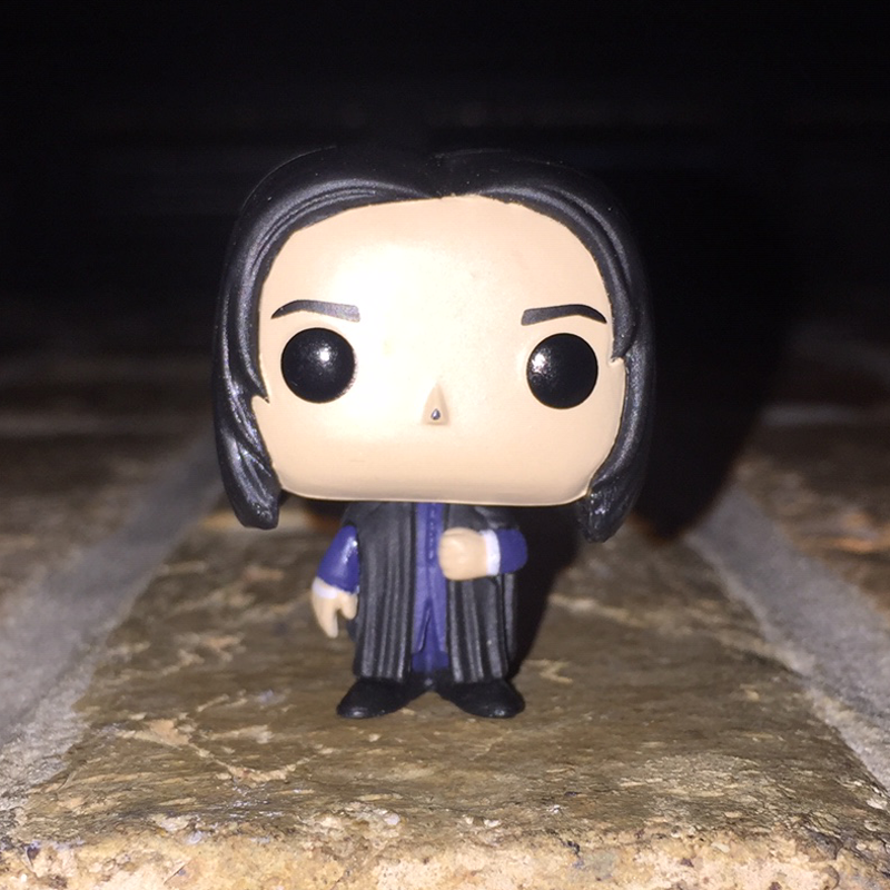 Severus Snape, wearing his teaching robe