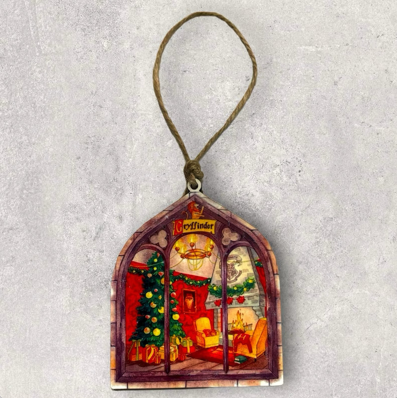 Choose from each of the four Hogwarts House common rooms for this Christmas ornament: Gryffindor, Slytherin, Ravenclaw, or Hufflepuff. Seen here is the Gryffindor option.