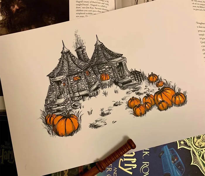 Picture of a cabin with pumpkins around it