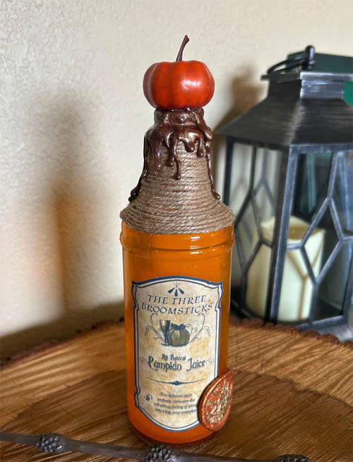 Bottle with a pumpkin on the top