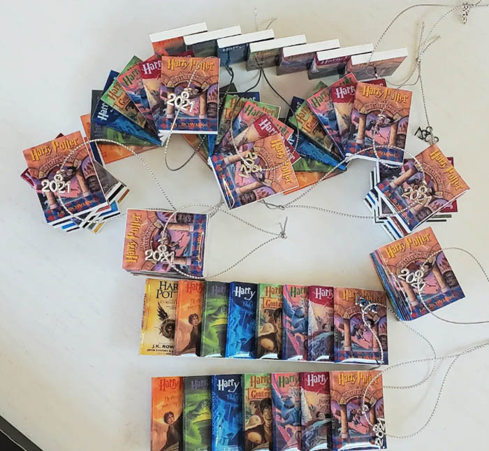 Ornaments of Harry Potter books in various stacked positions
